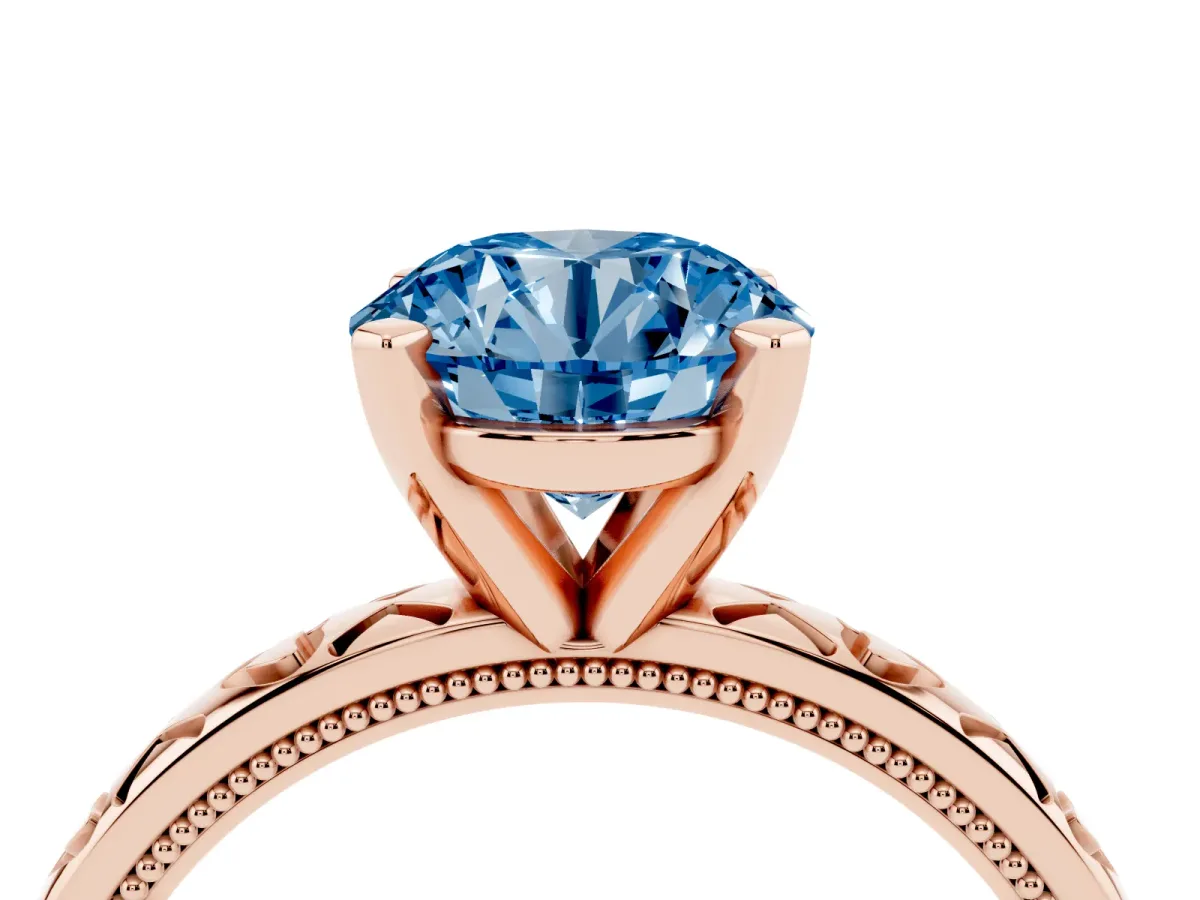 Fancy Blue Round Cut Solitaire Diamond Engagement Ring with XO Engraved Band and Four-Prong Setting Rose gold