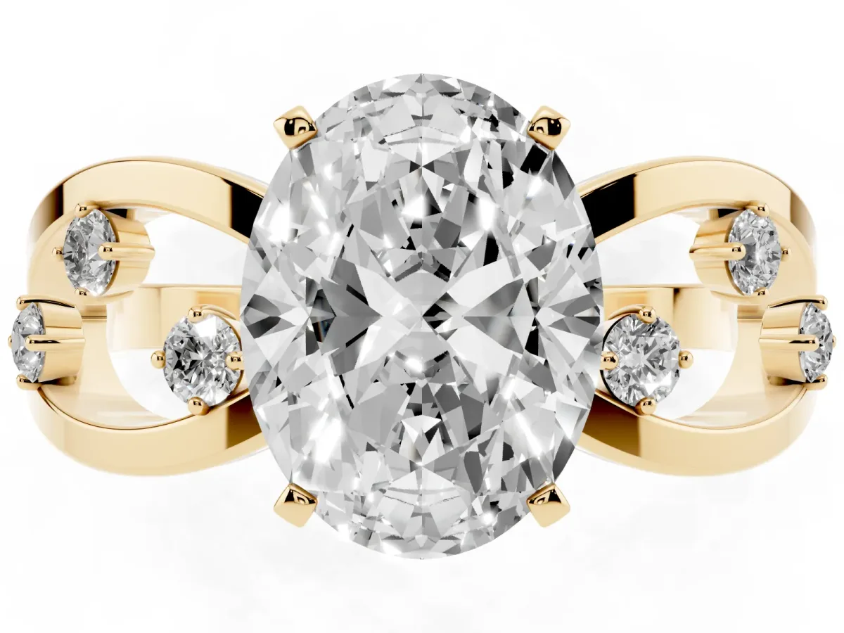 Oval Cut Cut Solitaire Diamond with Side Stones on Criss-Cross Band and Four-Prong Setting Yellow gold
