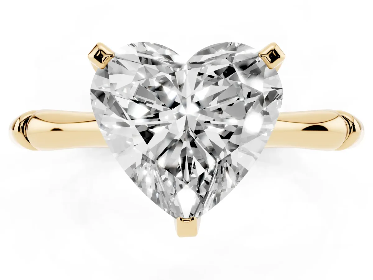 Heart Cut Solitaire Diamond Ring with Bamboo Band and Four-Prong Setting Yellow gold