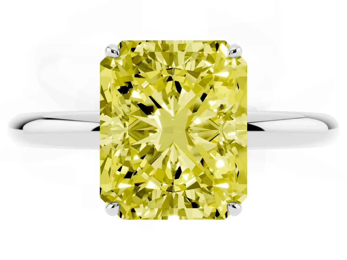 Fancy Yellow Radiant Cut Solitaire Diamond Ring with Four-Prong Setting on a Plain Band Platinum