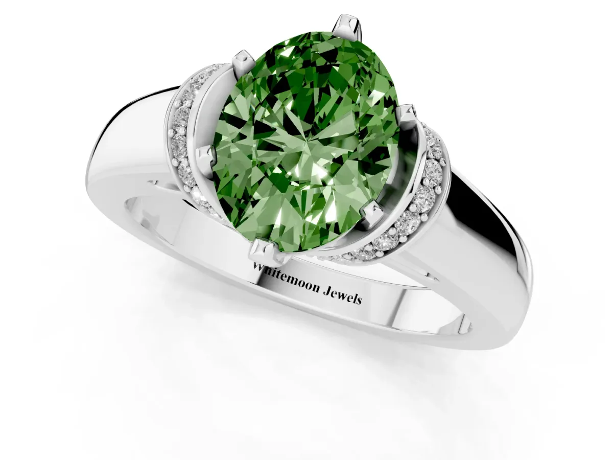 Fancy Green Oval Cut Solitaire Diamond Ring with Pave Band and Six-Prong Setting Silver