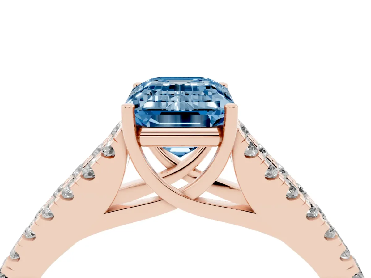 Fancy Blue Emerald Cut Diamond Split Shank Pavé Engagement Ring with Four-Prong Setting Rose gold