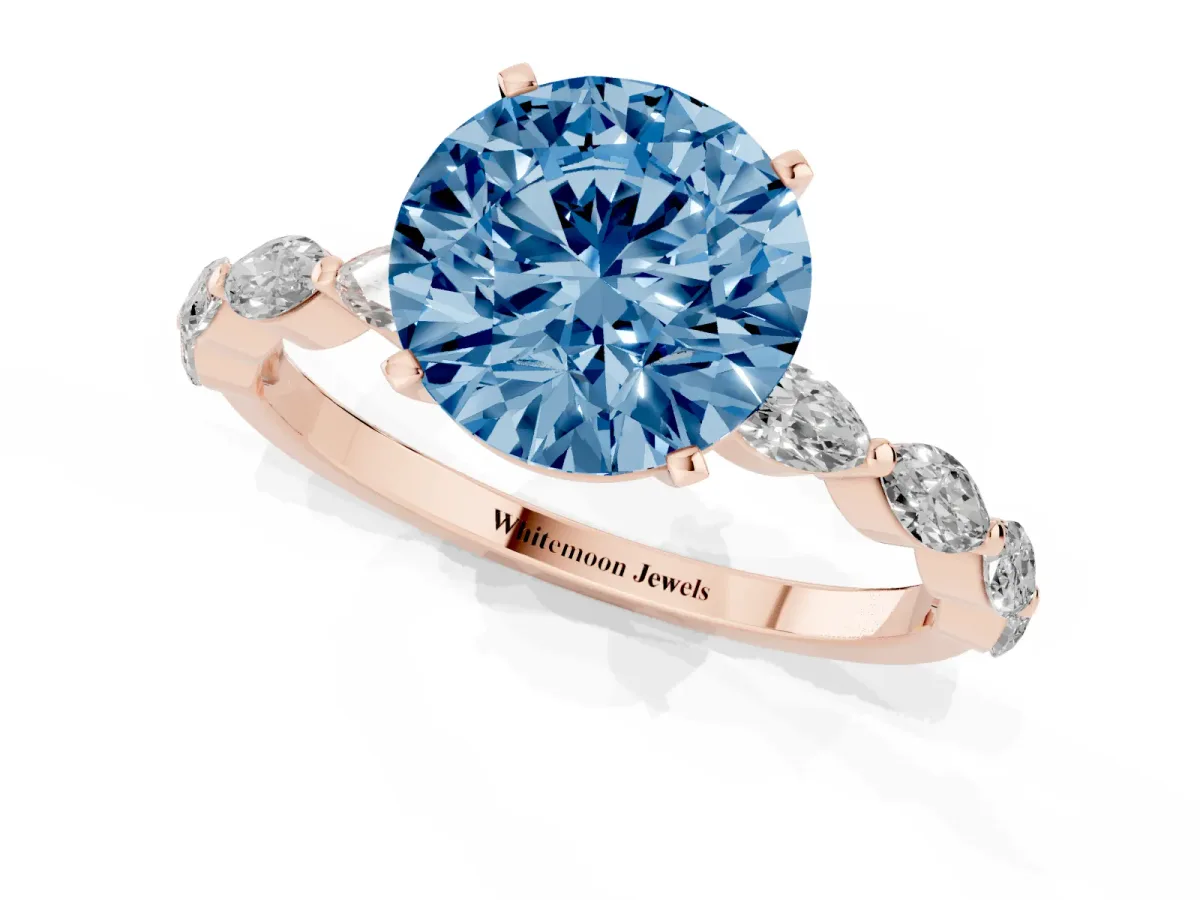 Fancy Blue Round Cut Diamond Ring with Marquise Side Stones and Prong Setting Rose gold