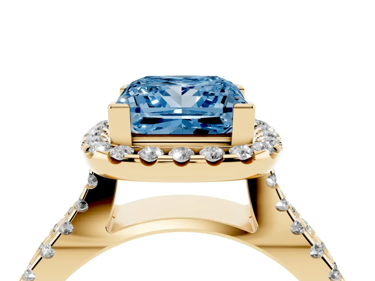 Fancy Blue Princess Cut Diamond Halo Ring with Split Shank Pavé Band and Prong Setting Yellow gold