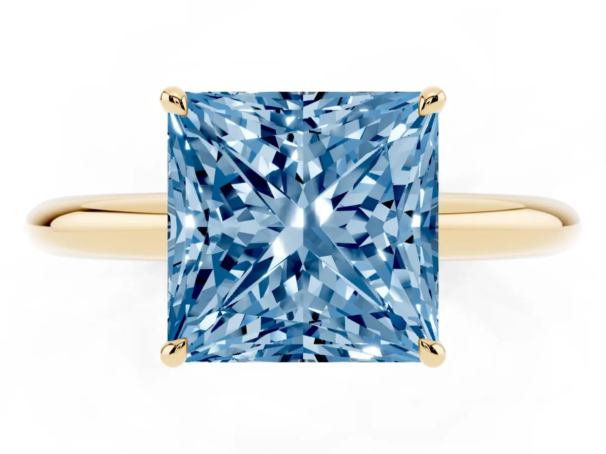 Fancy Blue Princess Cut Brilliant Solitaire Engagement Ring with Six-Prong Setting and Classic Band Yellow gold
