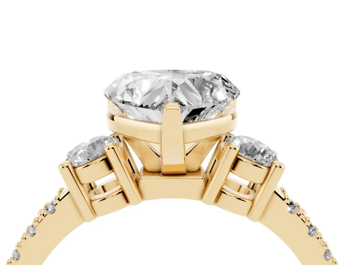 Heart Cut Three-Stone Diamond Pavé Band with Prong Setting Yellow gold