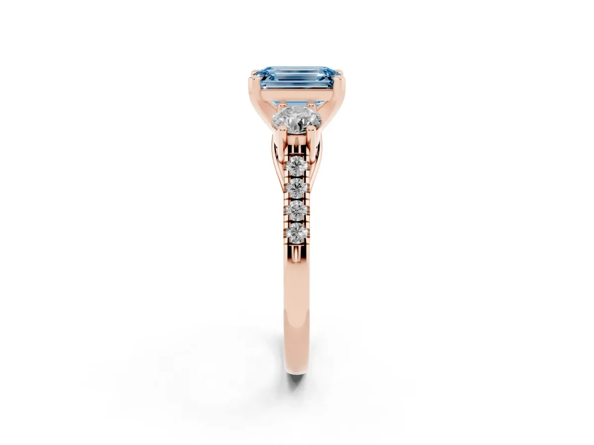 Fancy Blue Three-Stone Emerald Cut Diamond Pavé Band with Four-Prong Setting Rose gold