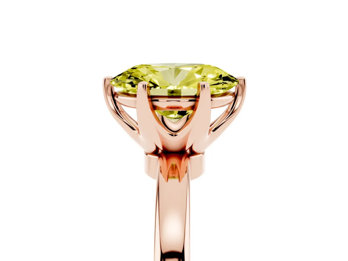 Fancy Yellow Oval Cut Solitaire Diamond Ring with Six-Prong Setting on a Classic Band Rose gold