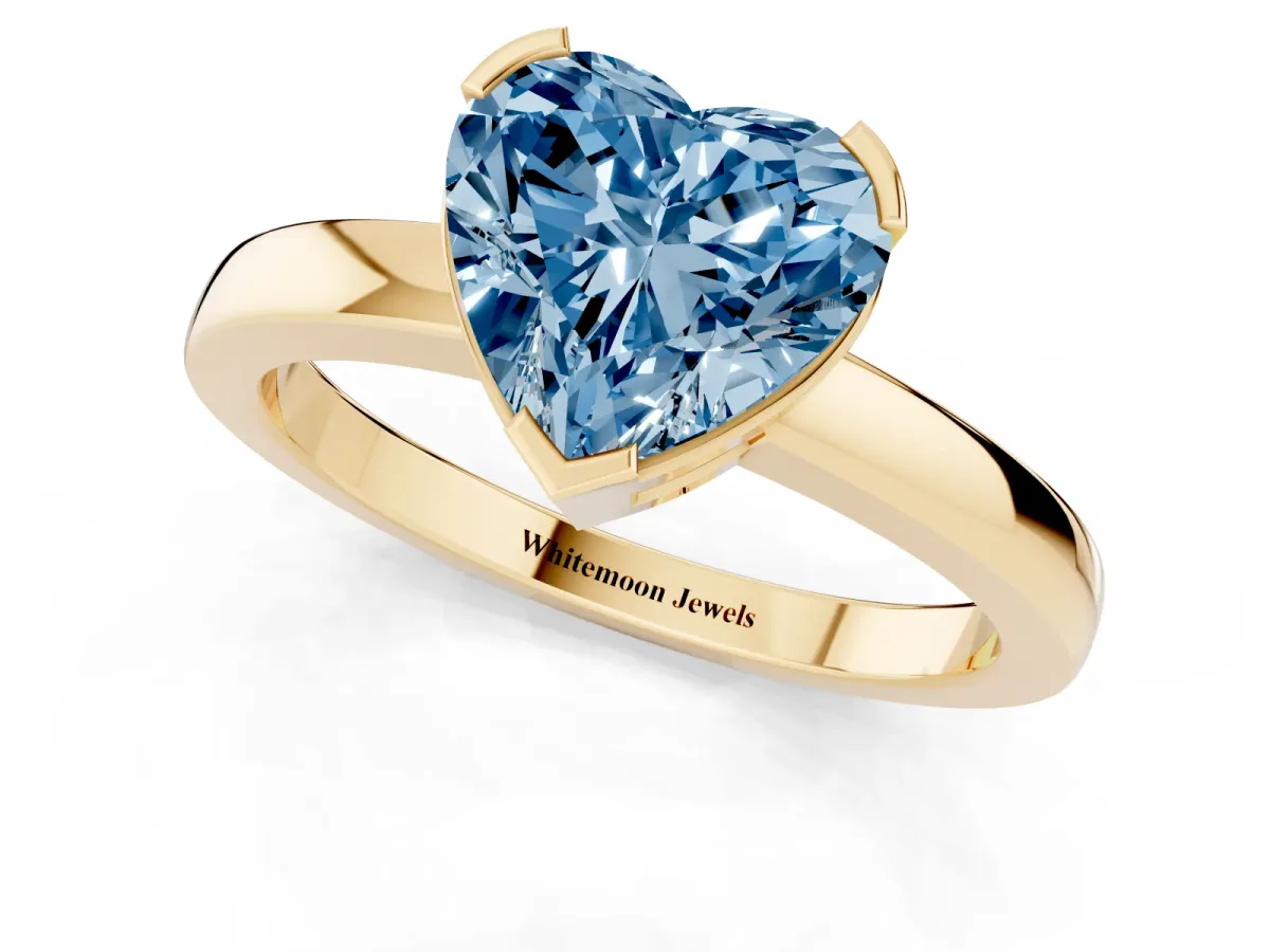 Fancy Blue Heart Cut Cut Solitaire Ring with Four-Prong Setting and Classic Band Yellow gold