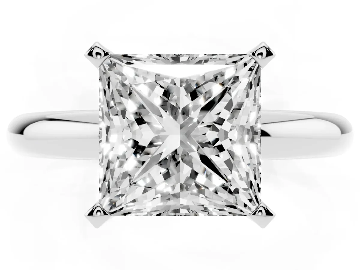 Princess Cut Diamond Solitaire Engagement Ring with Round Band and Four-Prong Setting Silver