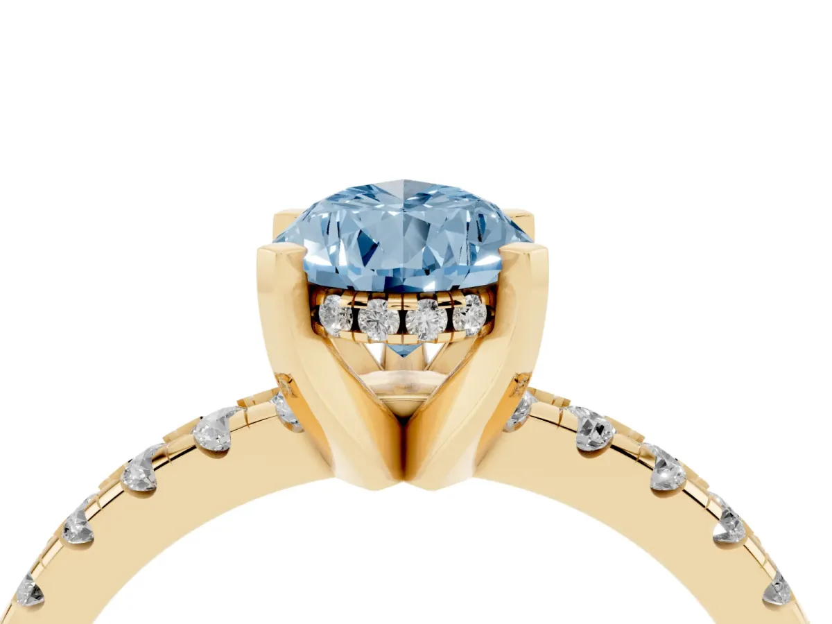 Fancy Blue Pear Cut Diamond Solitaire Ring with Round Pavé Band and Four-Prong Setting Yellow gold