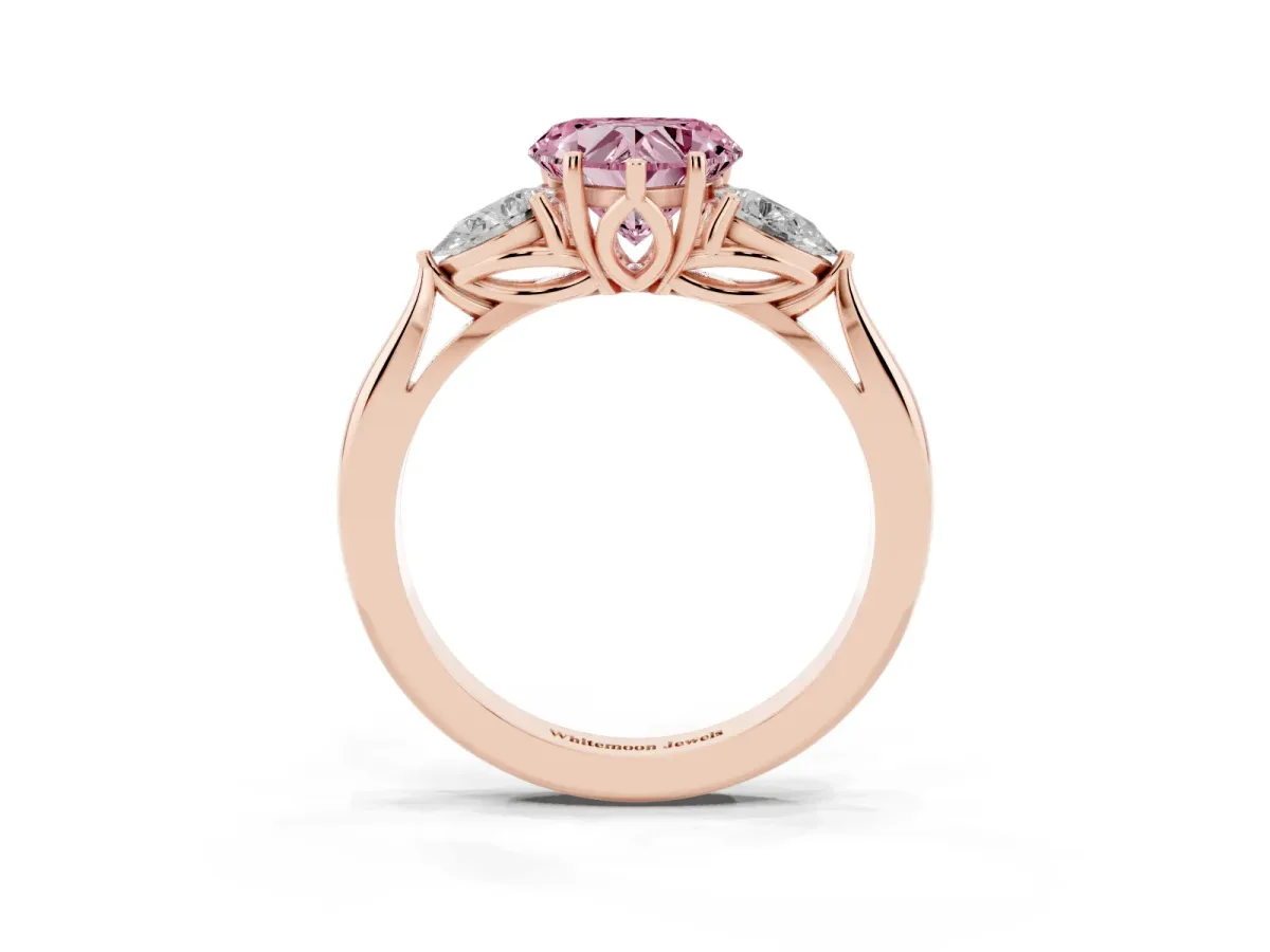 Fancy Pink Three-Stone Heart Cut Diamond Ring with Pear Side Stones in Four-Prong Setting Rose gold