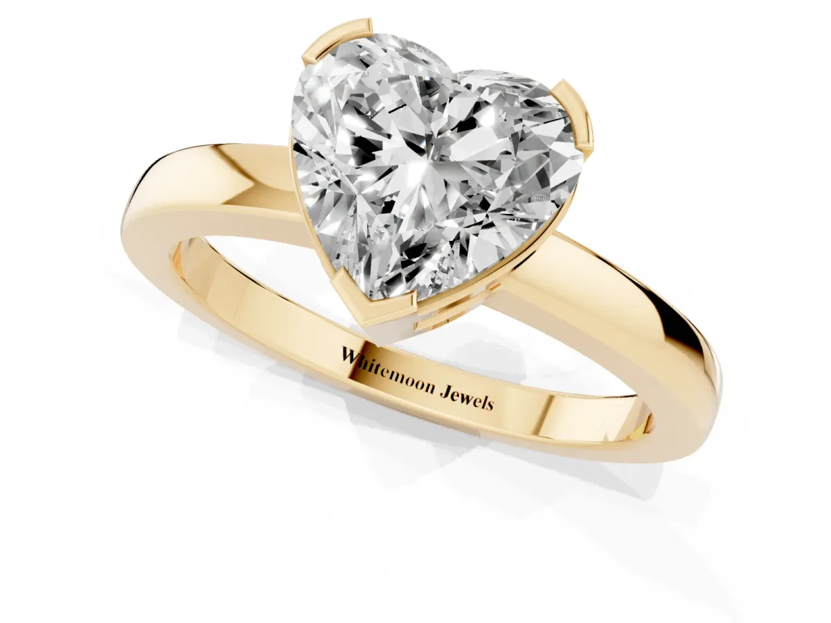 Heart Cut Cut Solitaire Ring with Four-Prong Setting and Classic Band Yellow gold