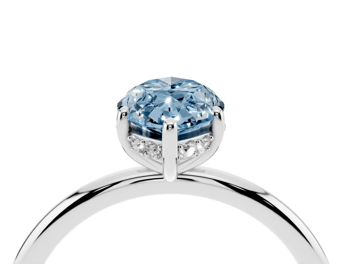 Fancy Blue Marquise Cut Solitaire Diamond Ring with a Classic Band and Four-Prong Setting White gold