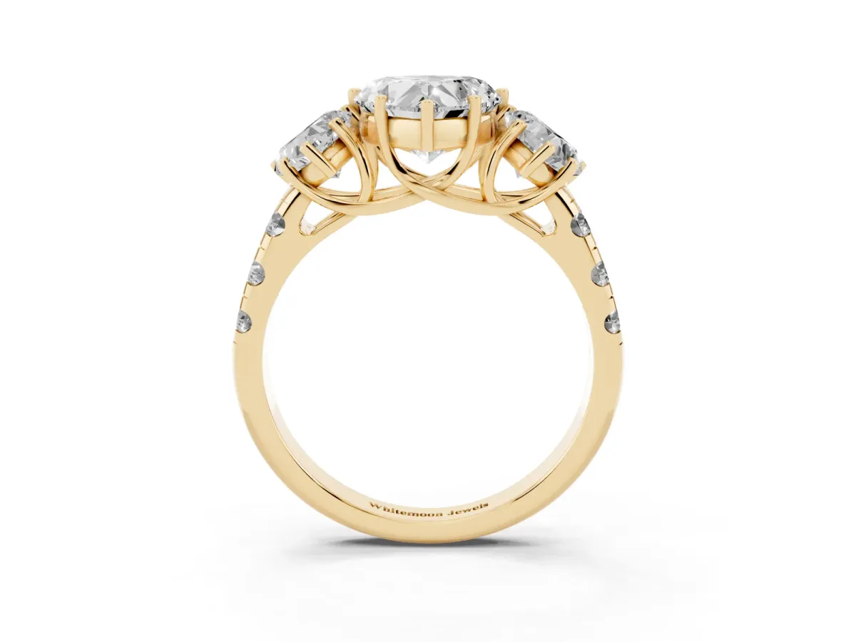 Three-Stone Heart Cut Diamond Pavé Band with Prong Setting Yellow gold