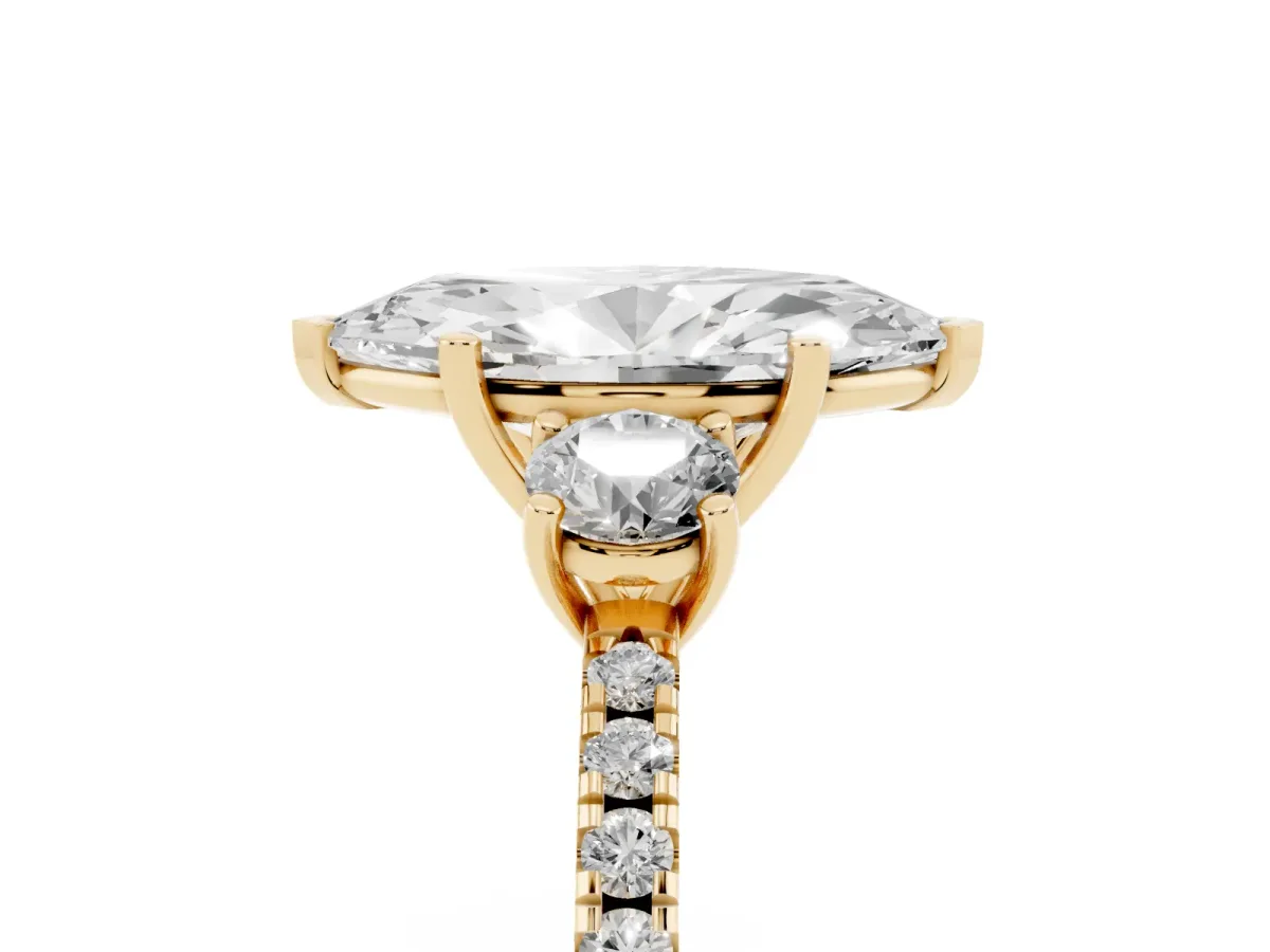 Three-Stone Marquise Cut Cut Diamond Pavé Band with Prong Setting Yellow gold