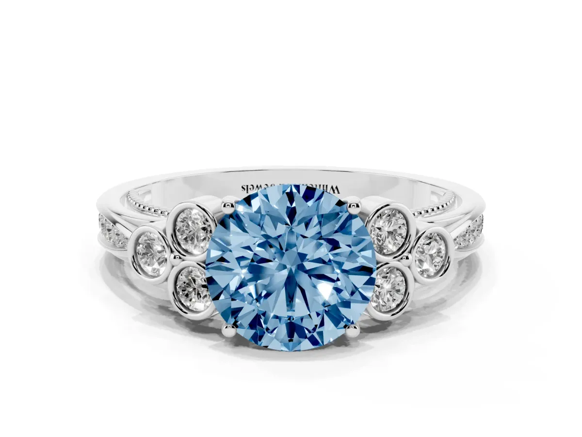 Fancy Blue Round Cut Cut Diamond Engagement Ring with Bezel Set Round Side Stones and Prong Setting Silver