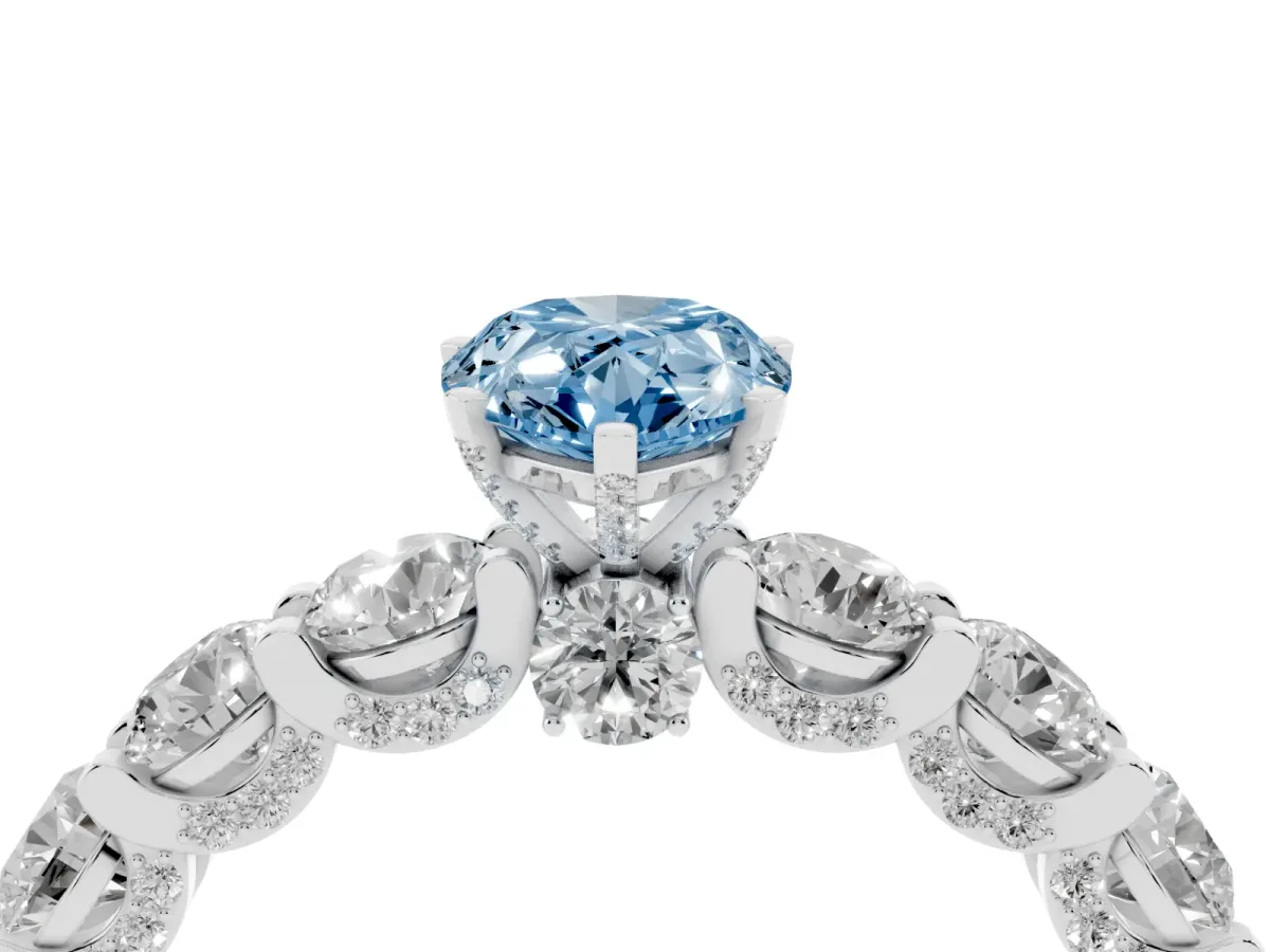Fancy Blue Pear Cut Diamond Side Stone Engagement Ring with Four-Prong Setting White gold