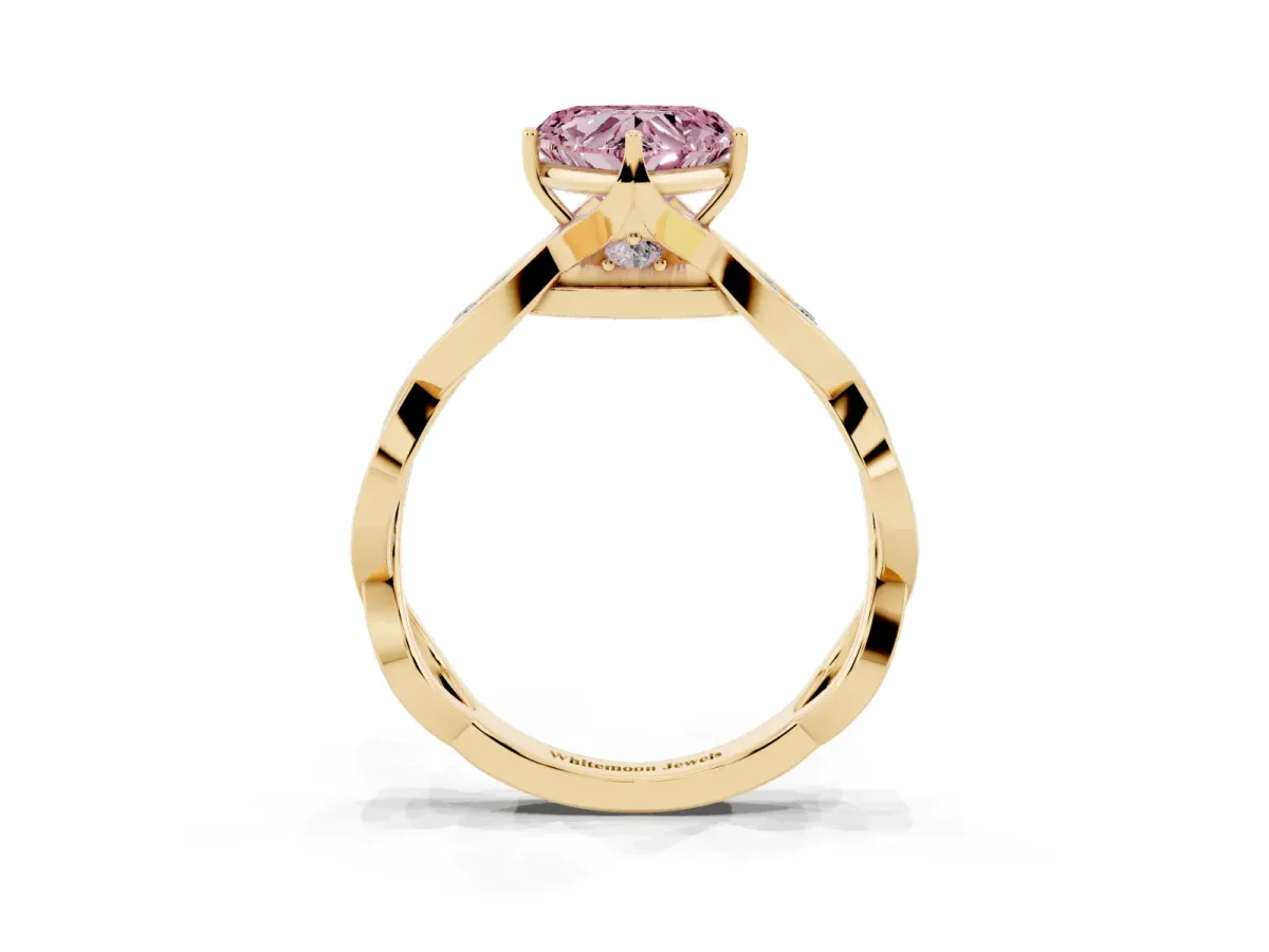 Fancy Pink Heart Cut Solitaire Twist Band with Leaf Prong Setting Yellow gold