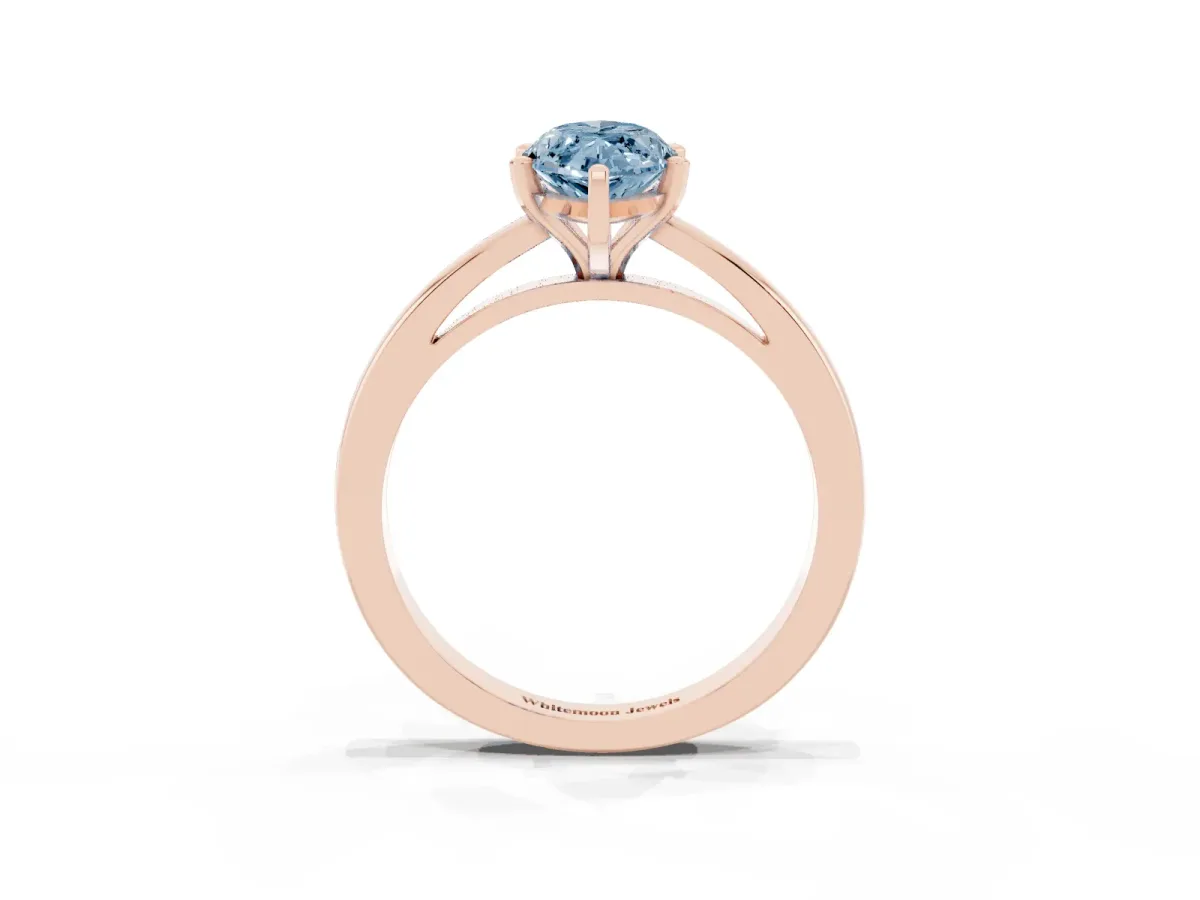 Fancy Blue Marquise Cut Solitaire Diamond Engagement Ring with Four-Prong Setting on a Classic Band Rose gold
