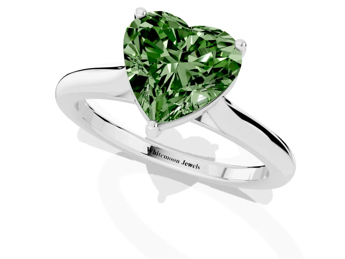 Fancy Green Heart Cut Cut Solitaire Ring with Cathedral Band and Four-Prong Setting Silver