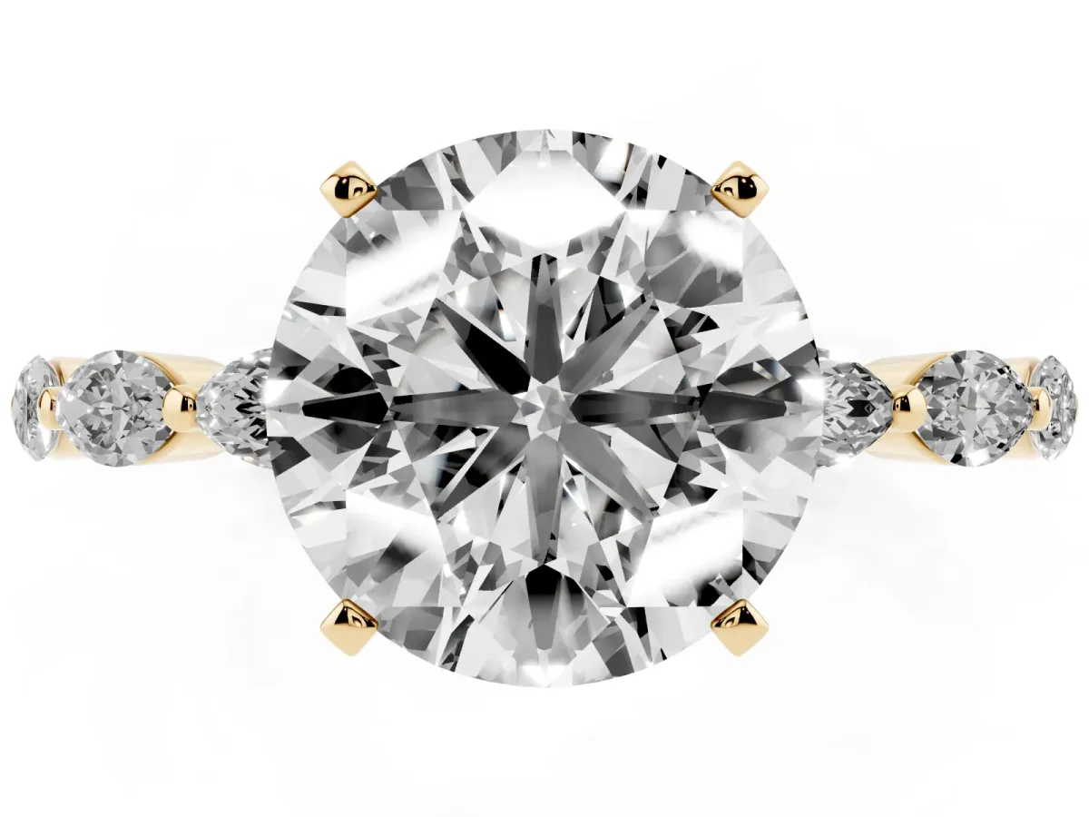 Round Cut Diamond Ring with Marquise Side Stones and Prong Setting Yellow gold