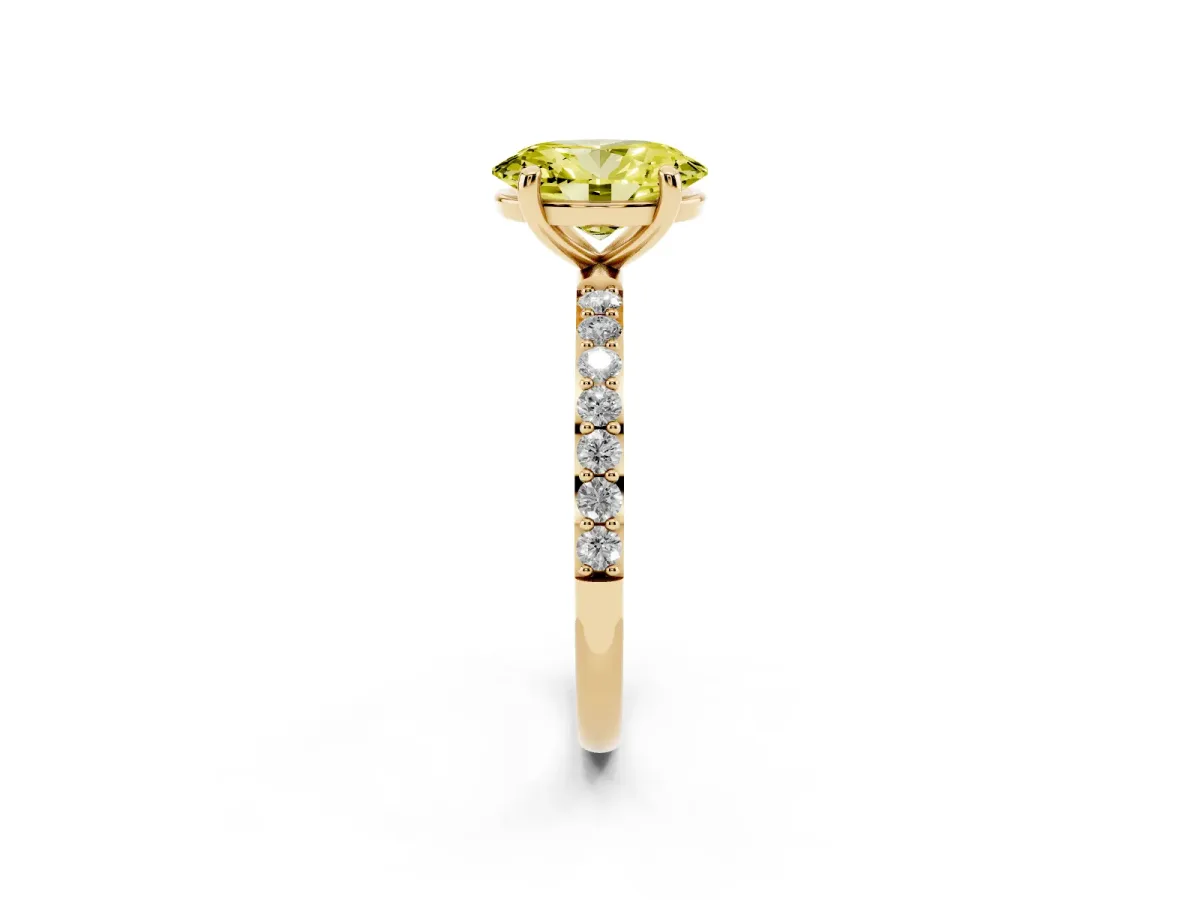 Fancy Yellow Oval Cut Diamond Solitaire Ring with Round Pavé Band and Prong Setting Yellow gold