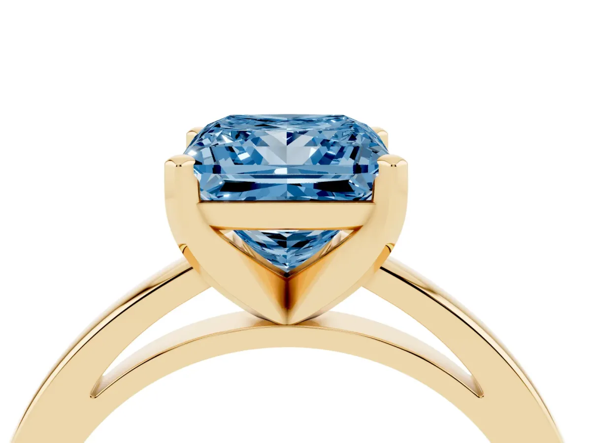 Fancy Blue Princess Cut Solitaire Diamond Engagement Ring with Four-Prong Setting on a Classic Band Yellow gold
