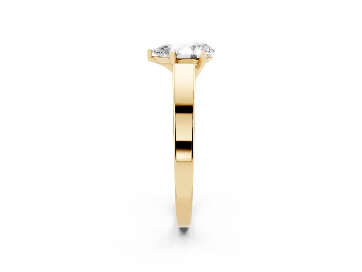 Pear Cut Solitaire Engagement Ring with Four-Prong Setting and Tapered Band Yellow gold