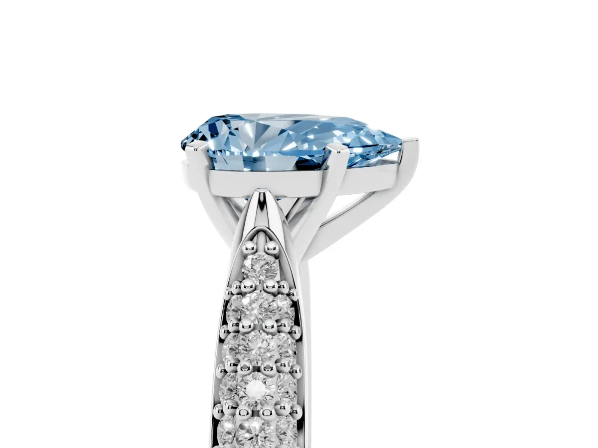 Fancy Blue Pear Cut Diamond Solitaire Engagement Ring with Multi-Row Round Pavé Band and Prong Setting White gold