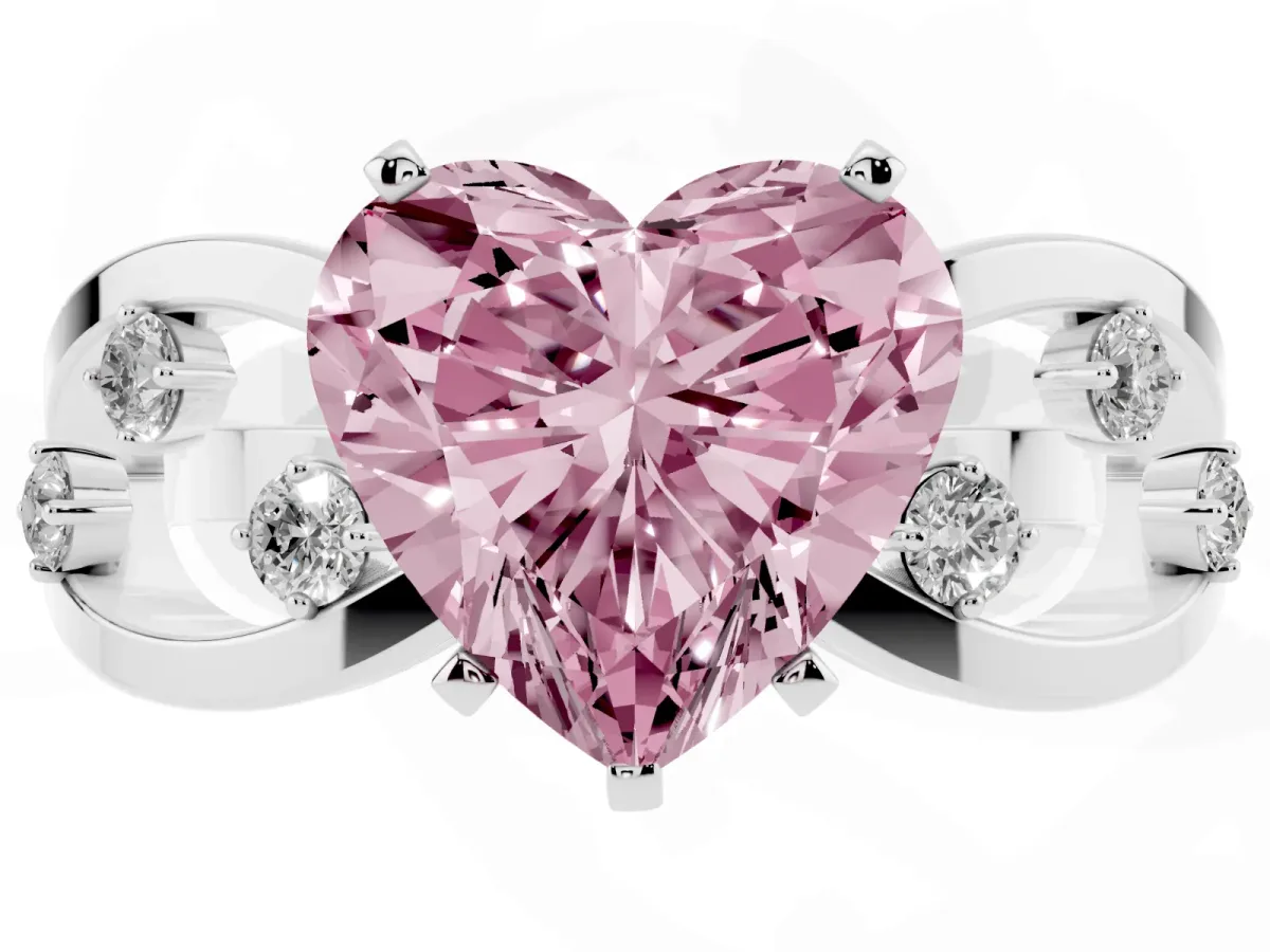 Fancy Pink Heart Cut Cut Solitaire Diamond with Side Stones on Criss-Cross Band and Four-Prong Setting Silver