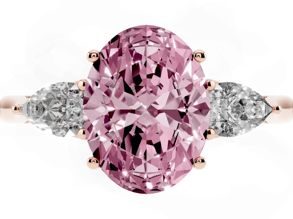 Fancy Pink Three-Stone Oval Cut Brilliant Diamond Solitaire Ring with Tapered Band and Four-Prong Setting Rose gold