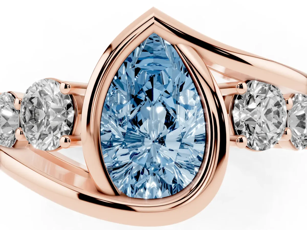 Fancy Blue Bezel Set Pear Cut Diamond Bypass Ring with Round Accents Rose gold