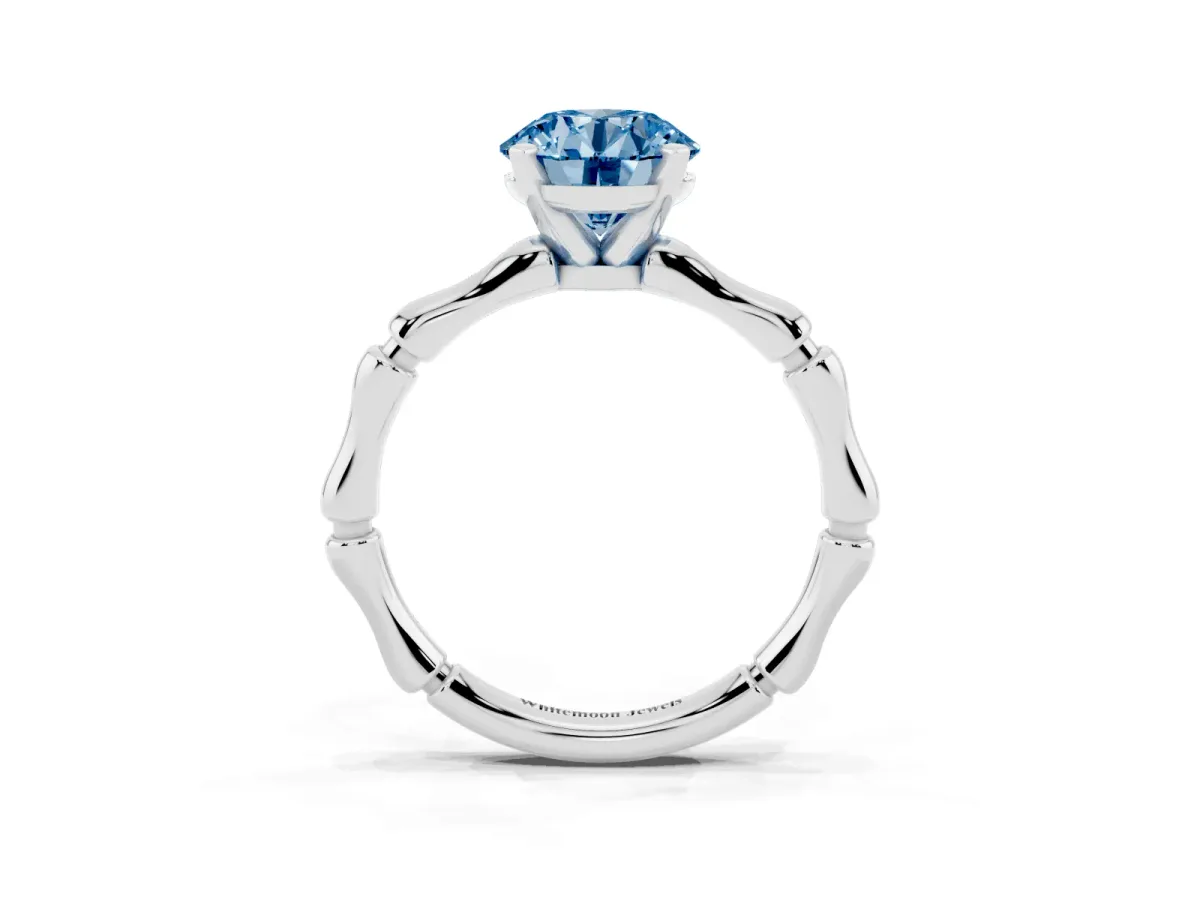 Fancy Blue Round Cut Solitaire Diamond Ring with Bamboo Band and Four-Prong Setting Silver