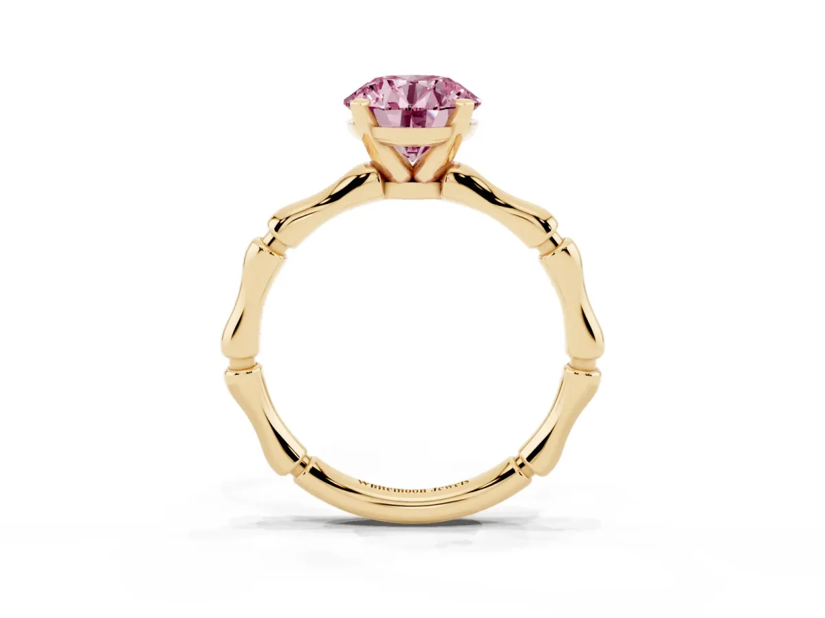 Fancy Pink Round Cut Solitaire Diamond Ring with Bamboo Band and Four-Prong Setting Yellow gold