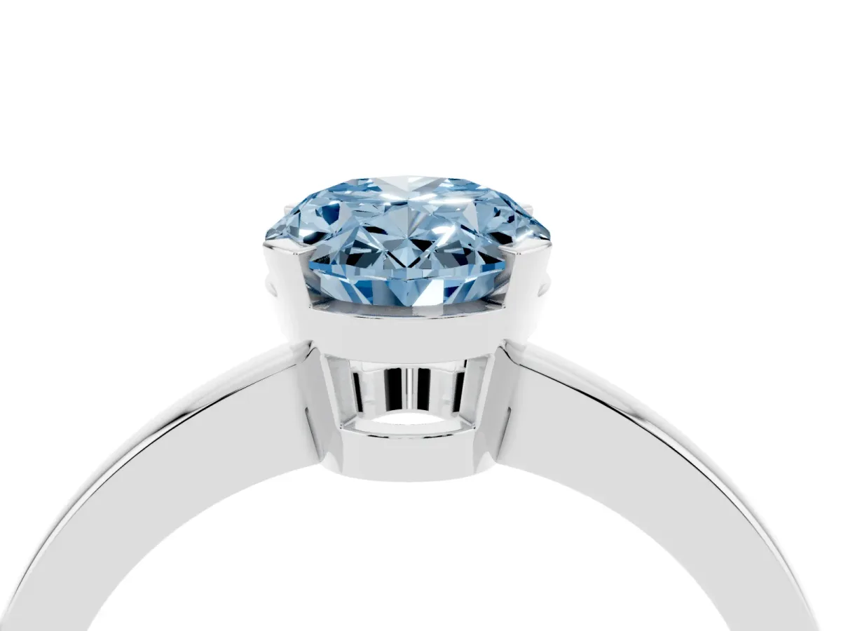 Fancy Blue Oval Cut Cut Solitaire Ring with Four-Prong Setting and Classic Band Silver