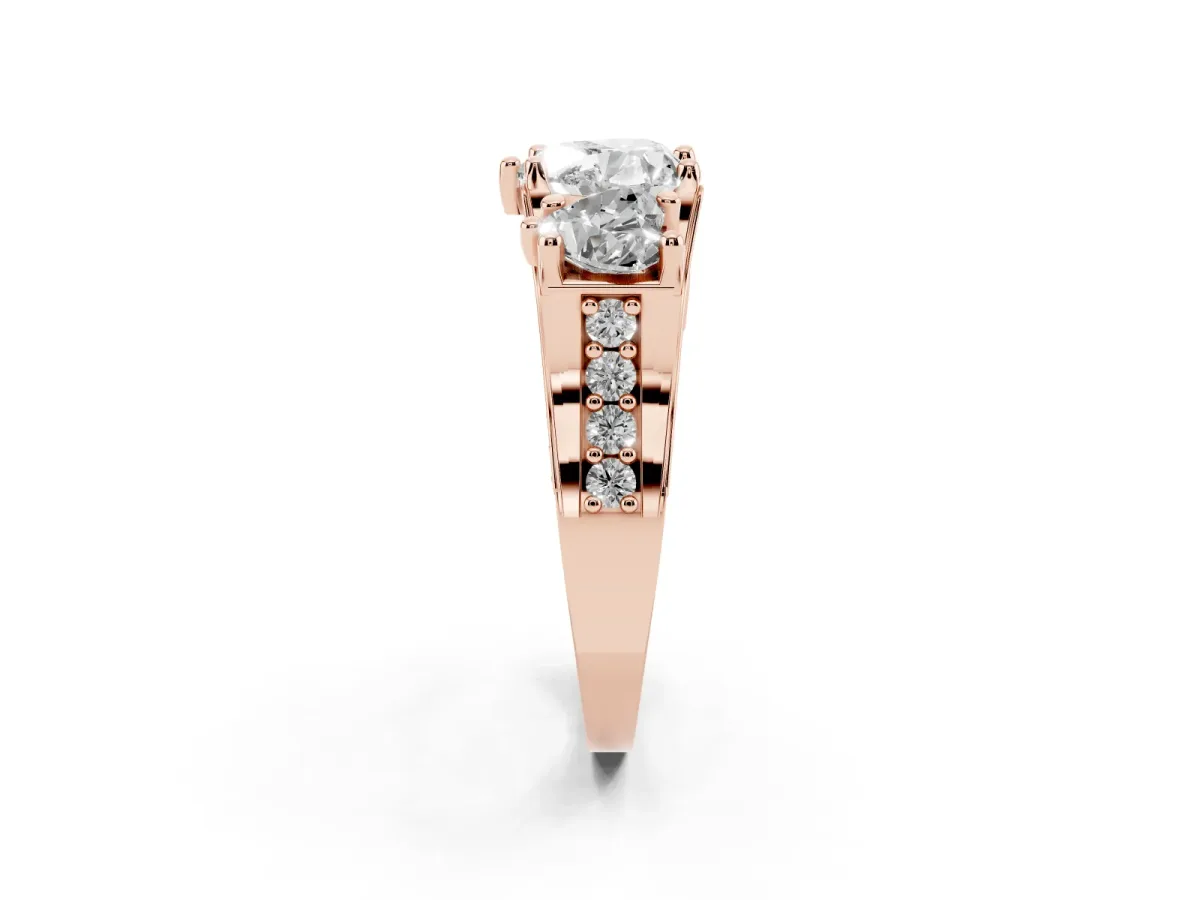 Heart Cut Diamond Three-Stone Ring with Channel Set Band and Four-Prong Setting Rose gold