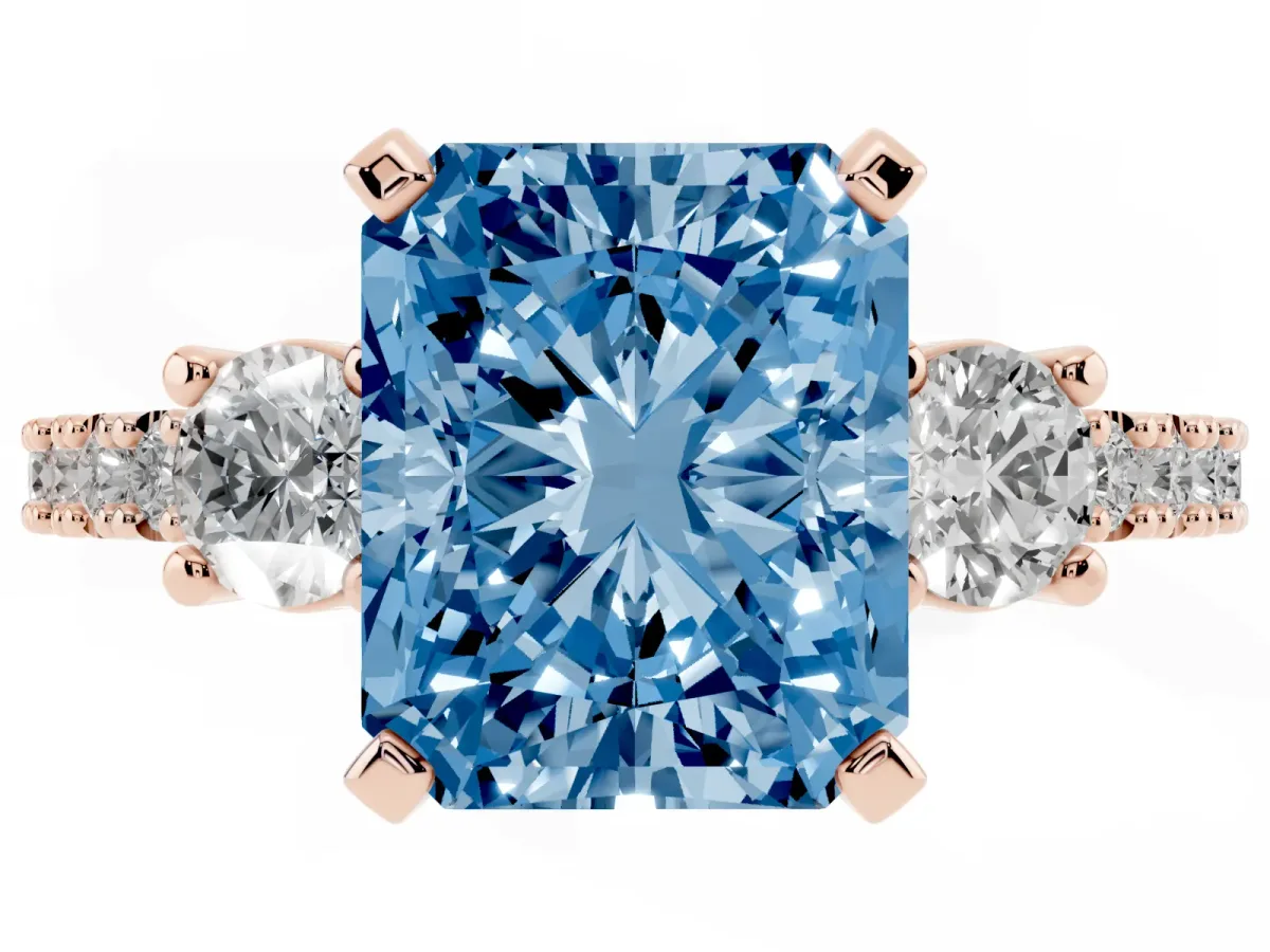 Fancy Blue Radiant Cut Three-Stone Diamond Pavé Band with Prong Setting Rose gold