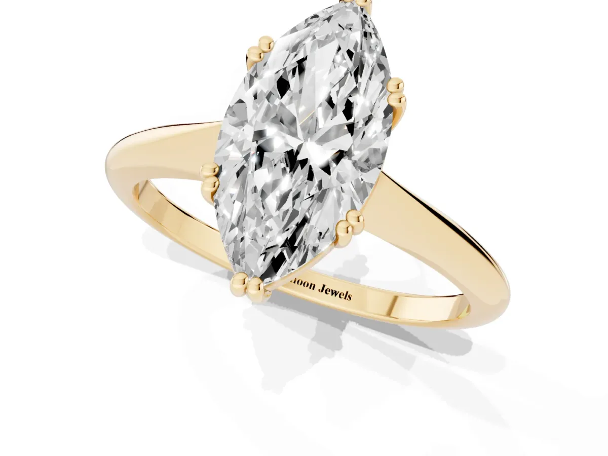 Marquise Cut Solitaire Diamond Ring with Six-Prong Setting and Classic Band Yellow gold