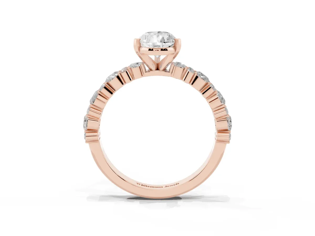 Pear Cut Diamond Side Stone Solitaire Ring with Round and Four-Prong Setting Rose gold