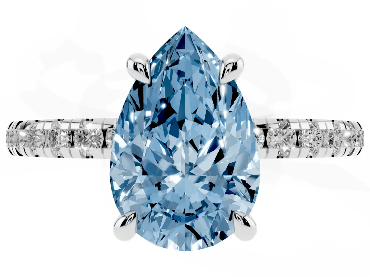 Fancy Blue Pear Cut Diamond Brilliant Solitaire Ring with Pavé Band and Four-Prong Setting Silver