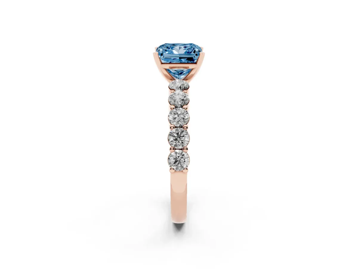 Fancy Blue Princess Cut Diamond Solitaire Ring with Shared Prong Round Side Stones Rose gold