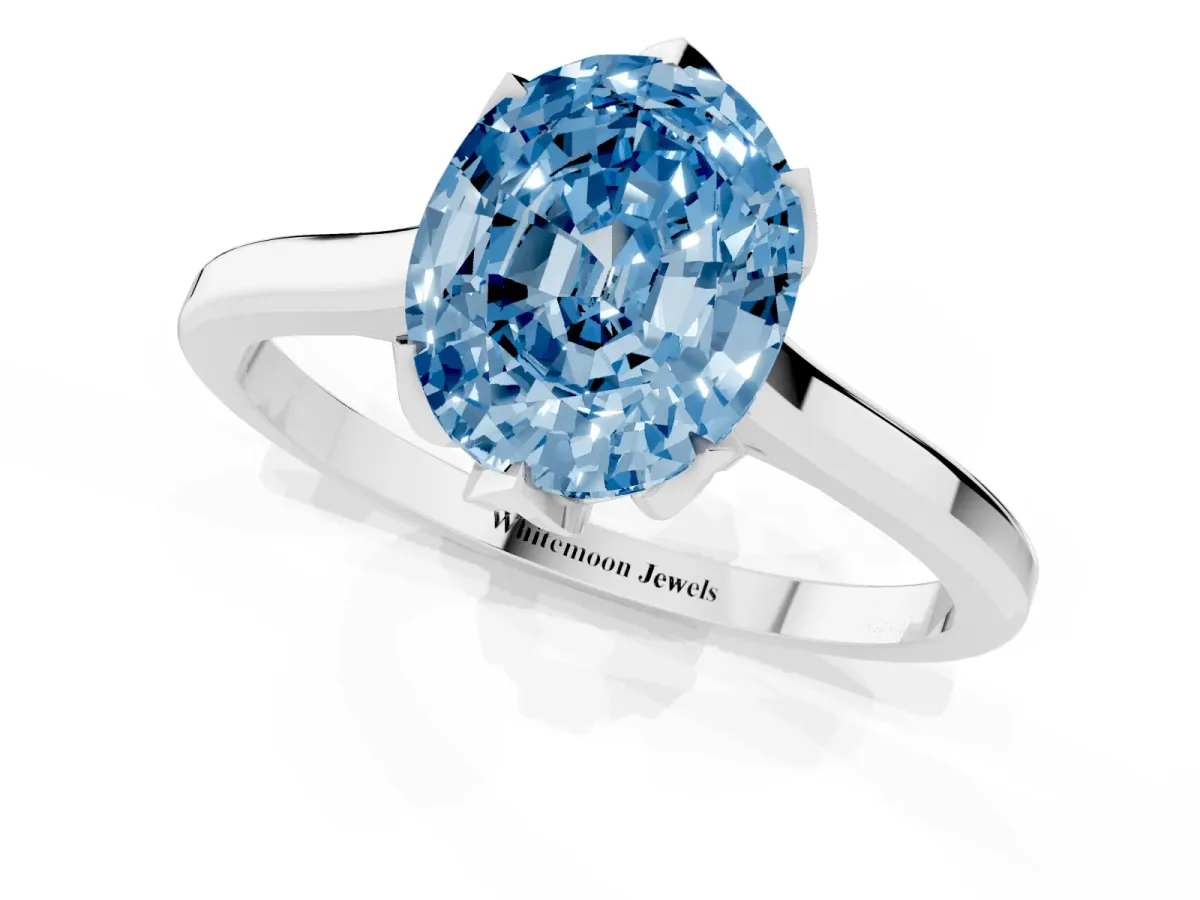 Fancy Blue Oval Cut Diamond Solitaire Ring with Flower Prong Setting and Classic Band Silver