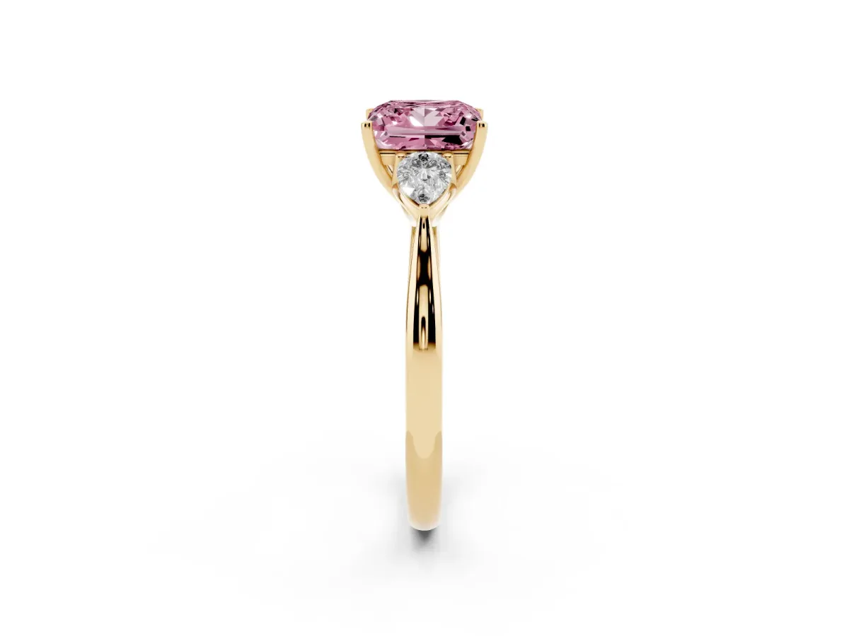 Fancy Pink Princess Cut Diamond Three-Stone Ring with Pear Side Stones and Prong Setting Yellow gold
