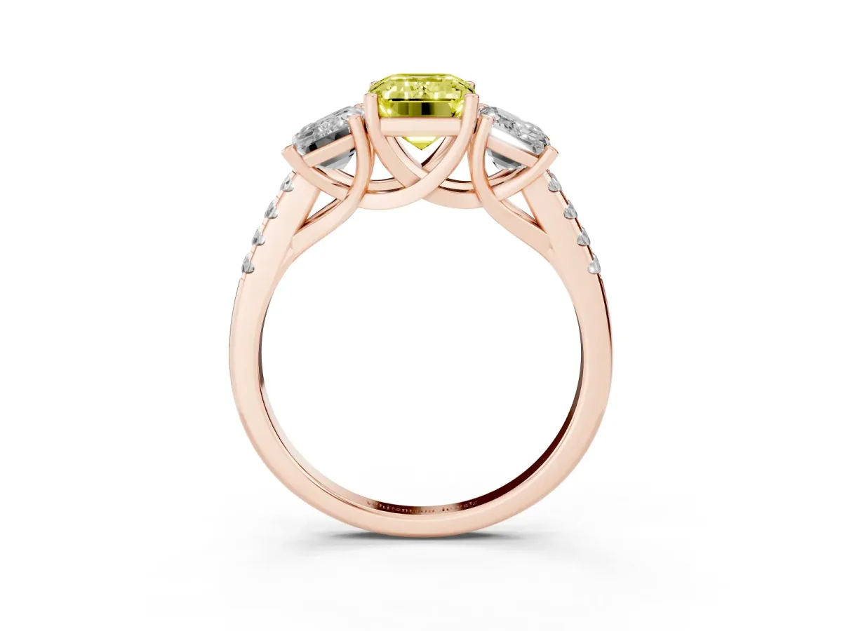 Fancy Yellow Three-Stone Emerald Cut Diamond Ring with Round Pavé Band and Prong Setting Rose gold