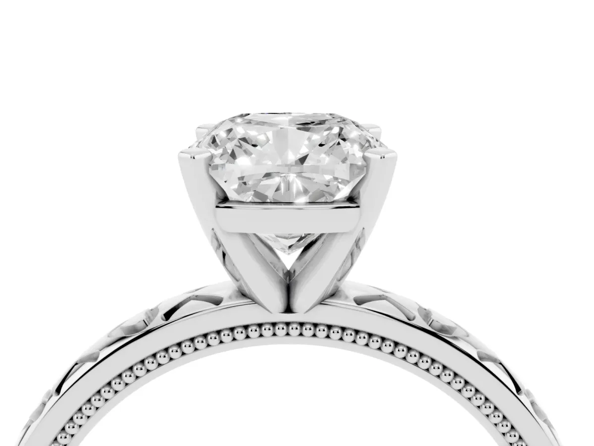 Cushion Cut Solitaire Diamond Engagement Ring with XO Engraved Band and Four-Prong Setting Platinum