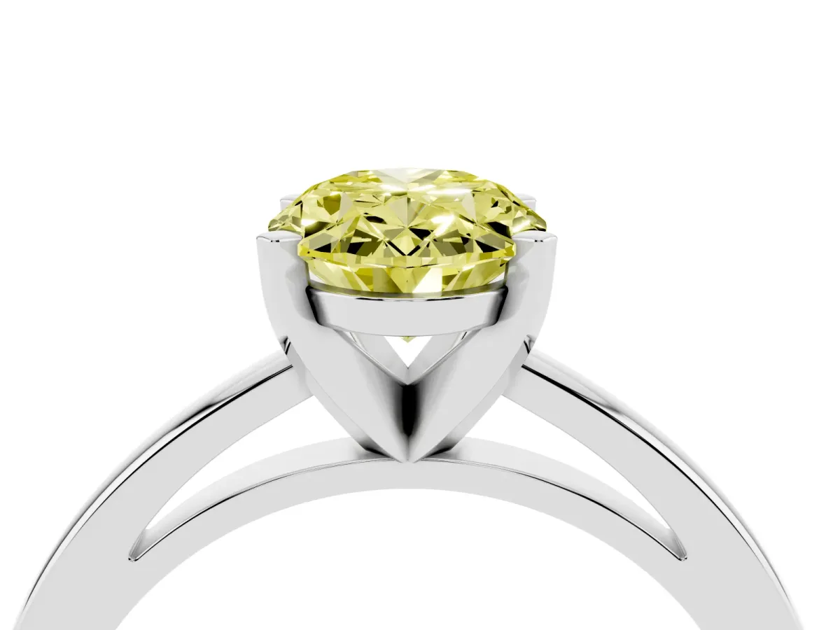 Fancy Yellow Oval Cut Solitaire Diamond Engagement Ring with Four-Prong Setting on a Classic Band Silver
