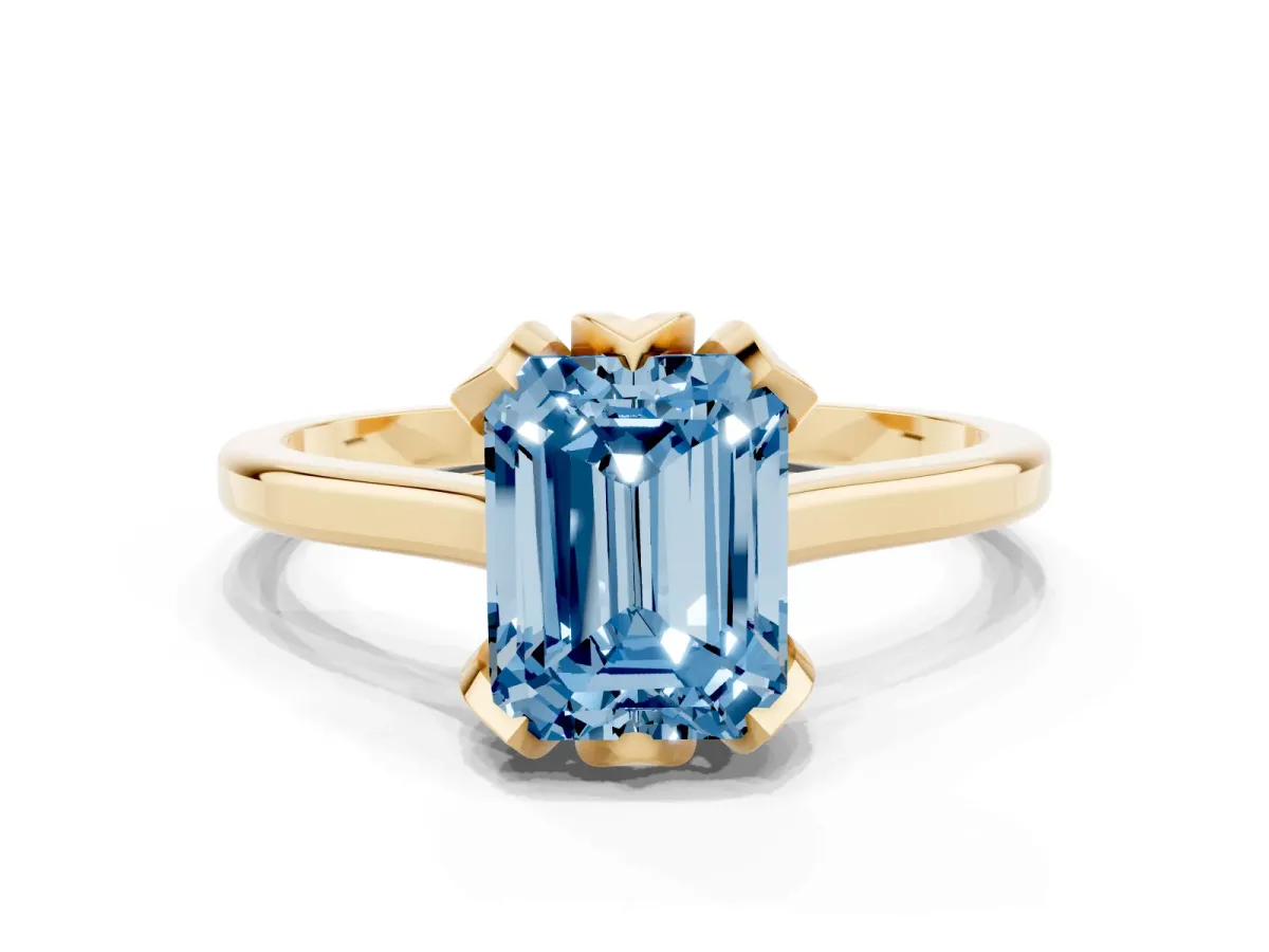 Fancy Blue Emerald Cut Diamond Solitaire Ring with Flower Prong Setting and Classic Band Yellow gold