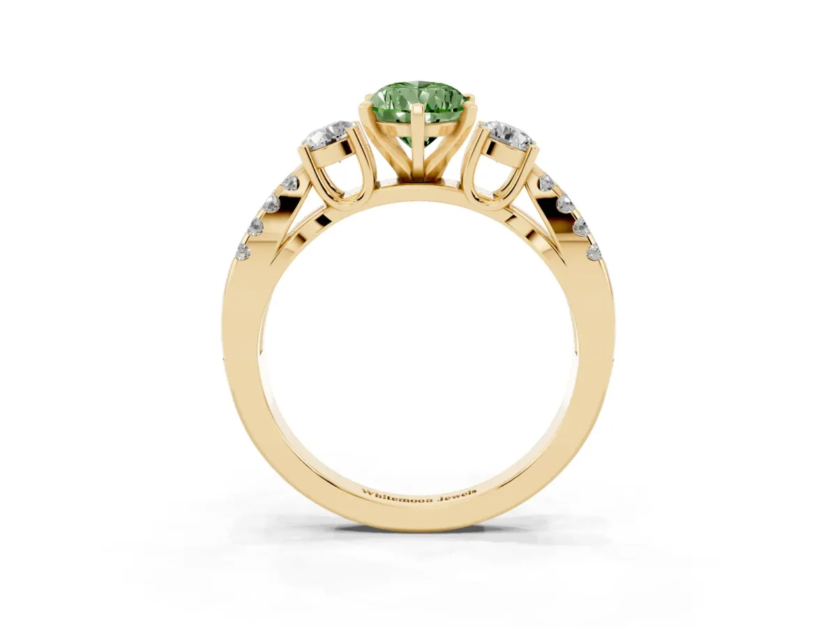 Fancy Green Pear Cut Diamond Three-Stone Ring with Pavé Split Shank and Four-Prong Setting Yellow gold