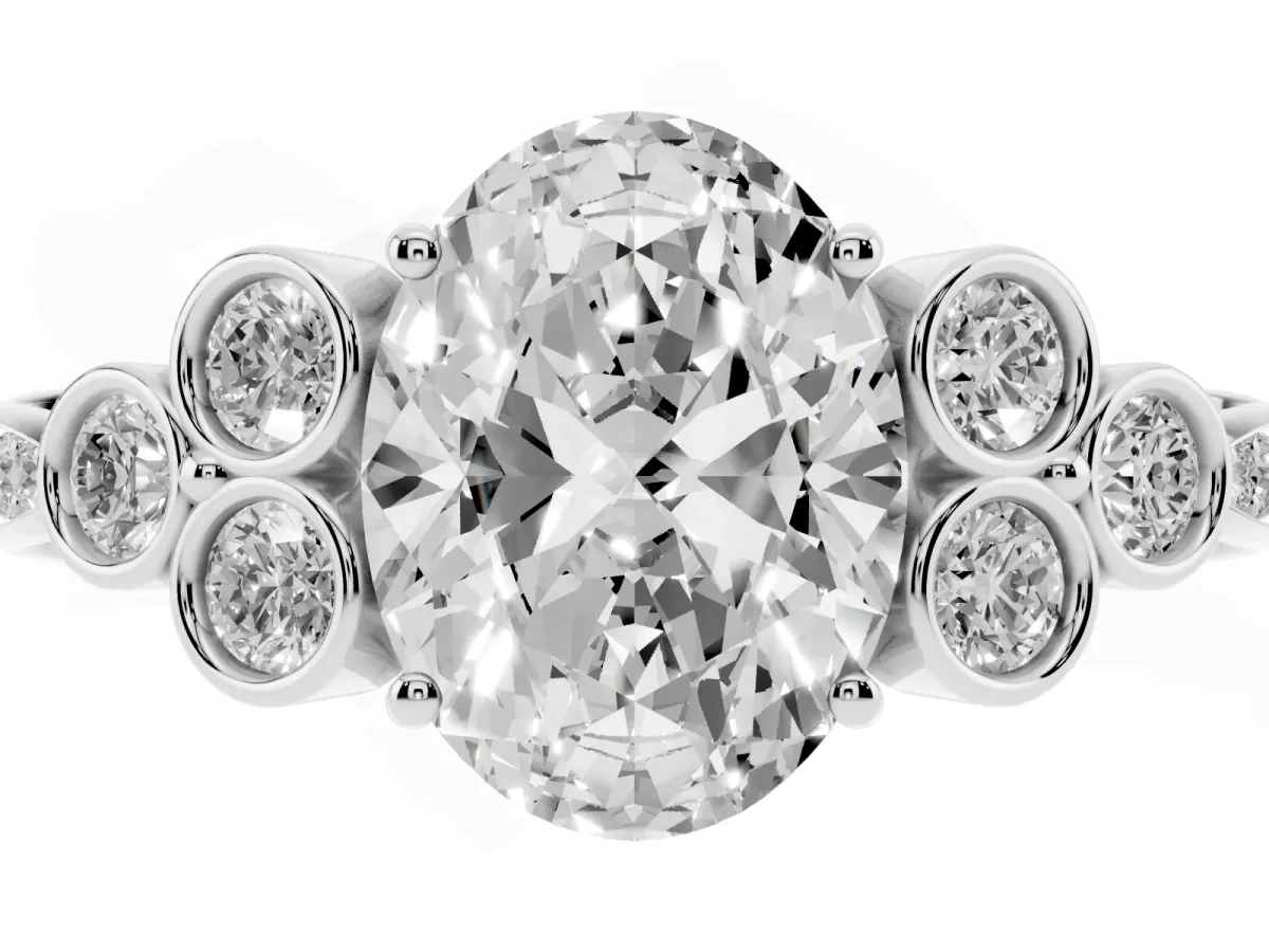 Oval Cut Cut Diamond Engagement Ring with Bezel Set Round Side Stones and Prong Setting Silver